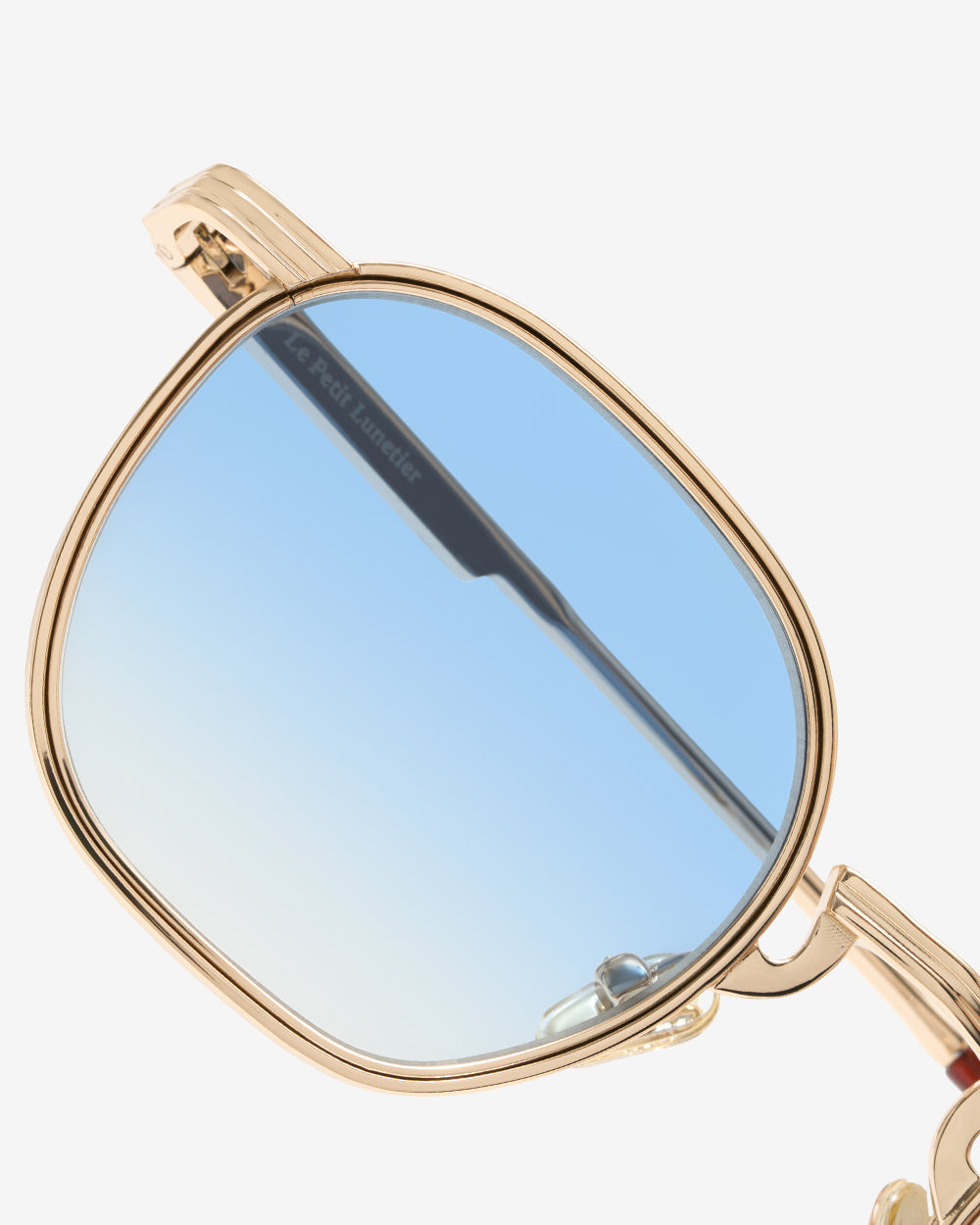 Lunettes de soleil Rick Gold — monture hexagonale métal, vue de trois-quarts