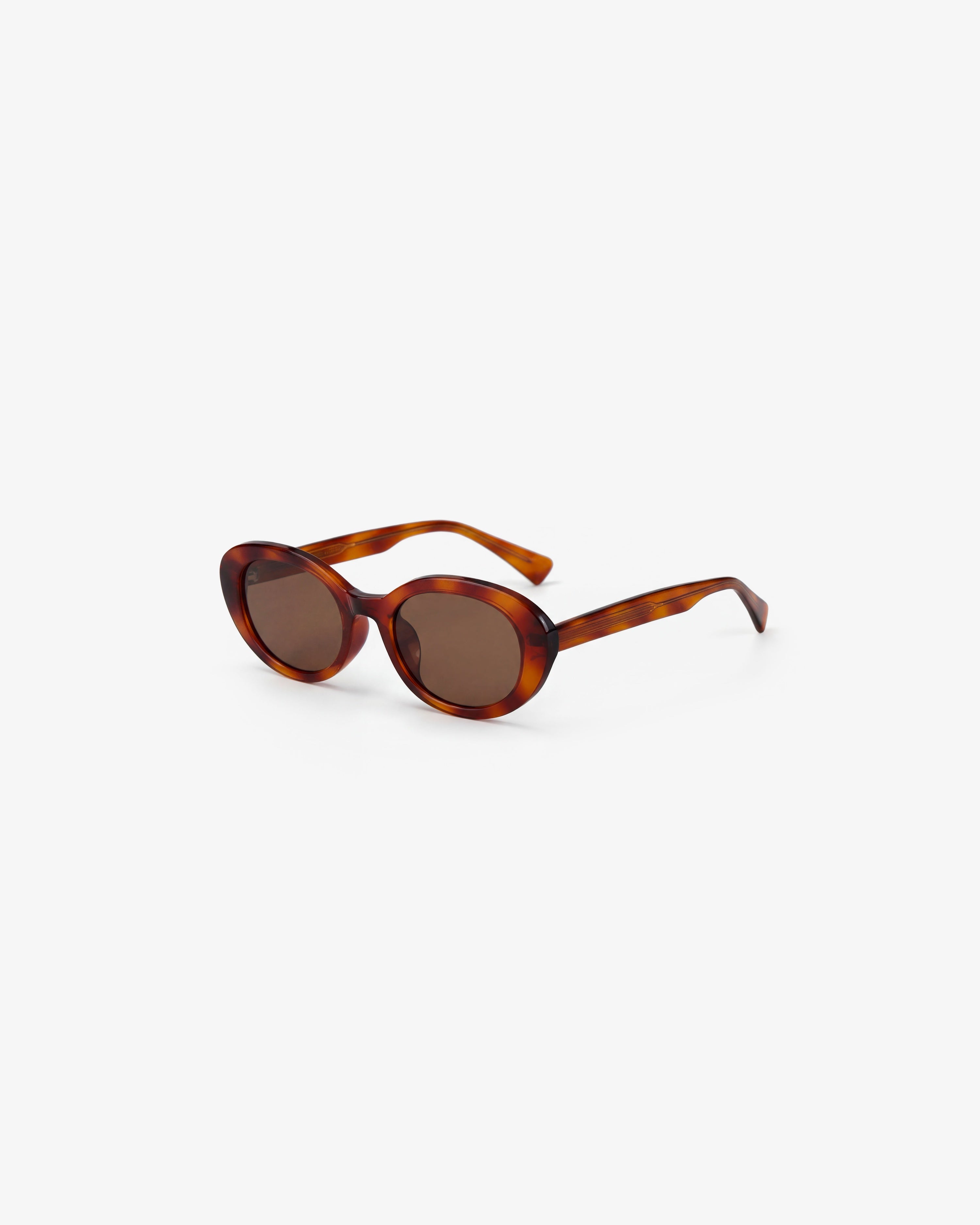 Lunettes de soleil Sienna Ecaille — monture ovale acétate, vue de trois-quarts