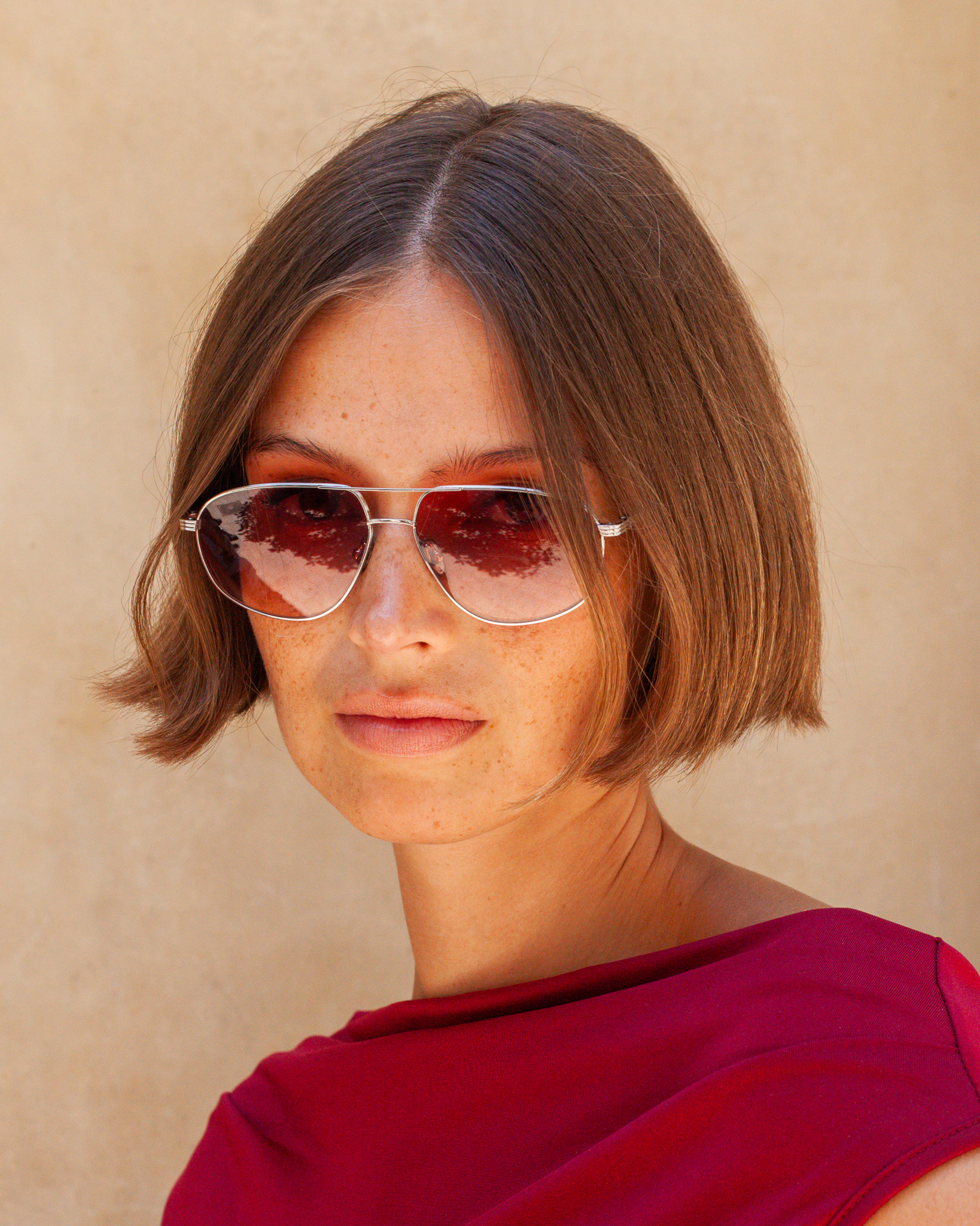 Lunettes de soleil Franck Silver — monture aviateur, portées par une femme