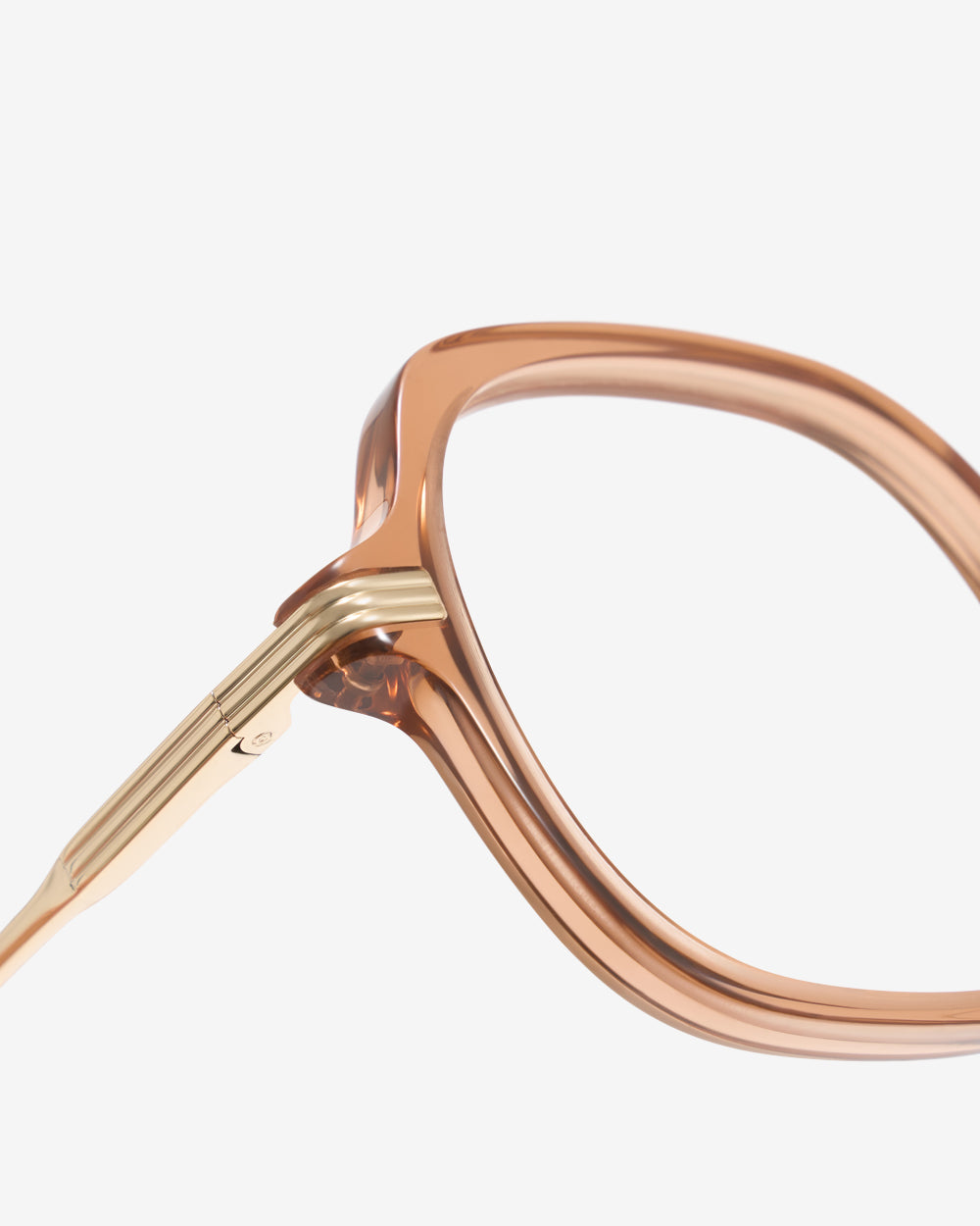 Gros plan sur la monture ronde acétate des lunettes de vue Jude Nude